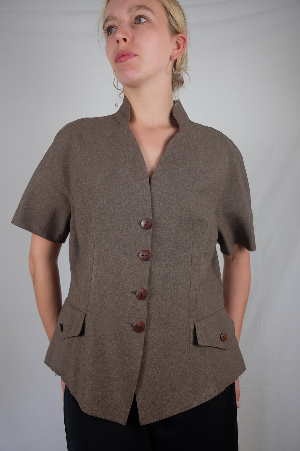 brown short sleeve vest
