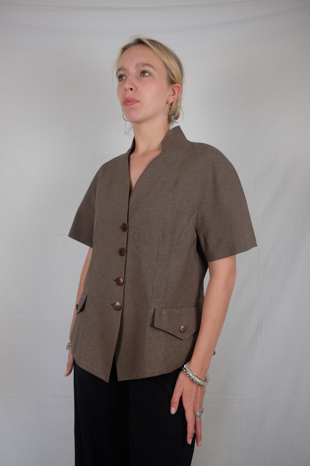 brown short sleeve vest