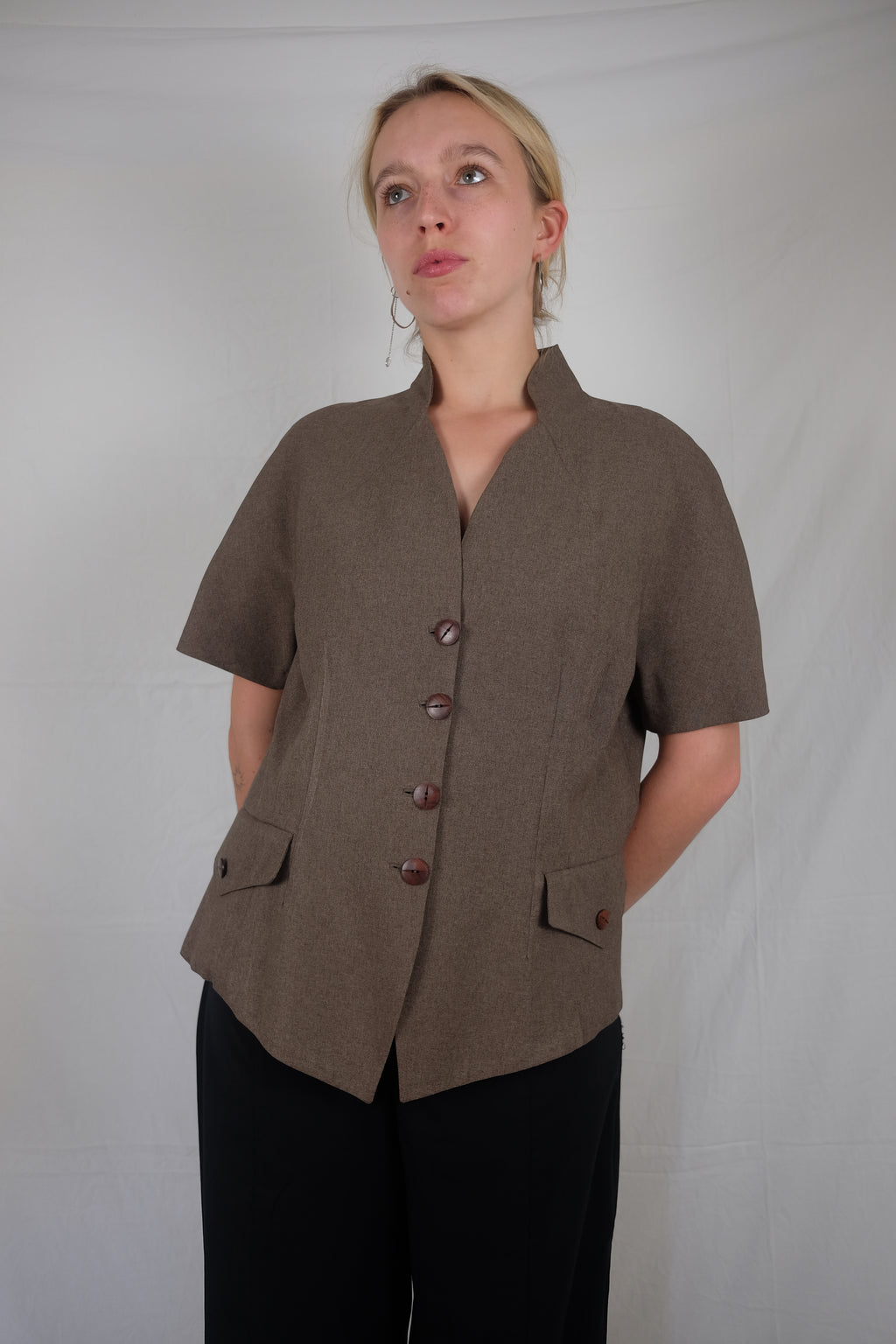 brown short sleeve vest