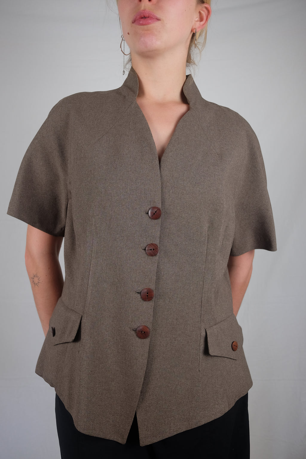 brown short sleeve vest