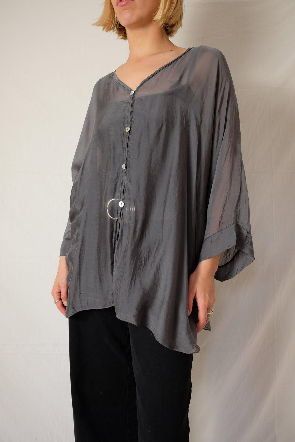 see-through flowy blouse