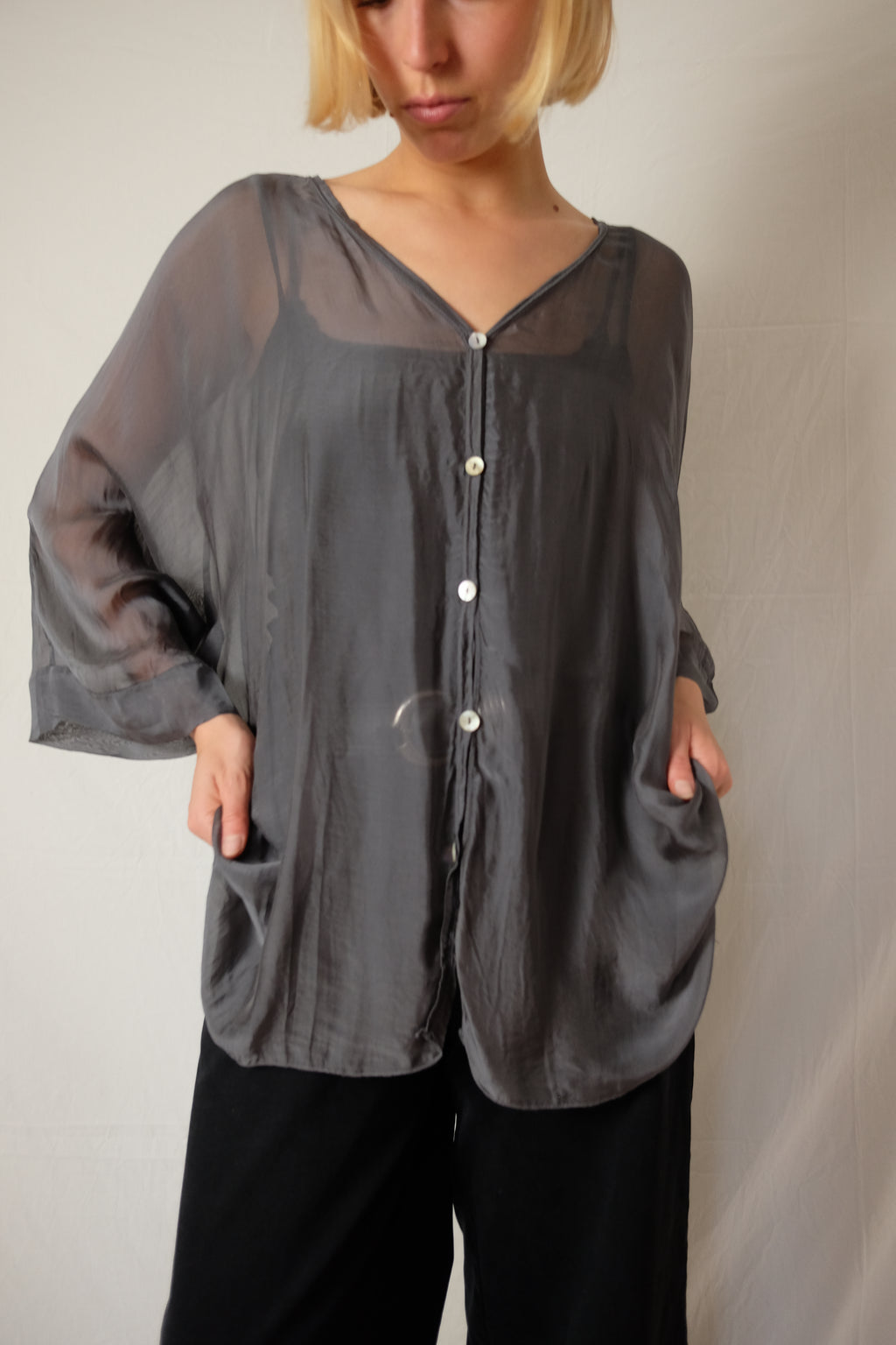 see-through flowy blouse